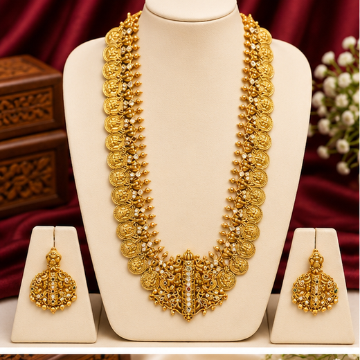 Matte finishing temple set features a long Lakshmi coin design haram necklace