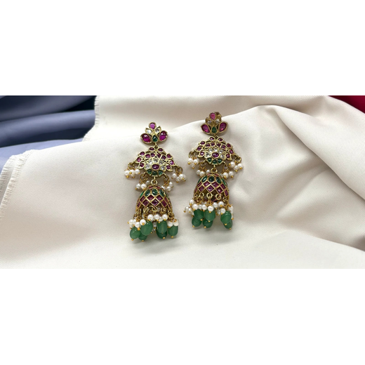 Jhumka emerald Kempu stones with pearl and green bead embellishment earrings
