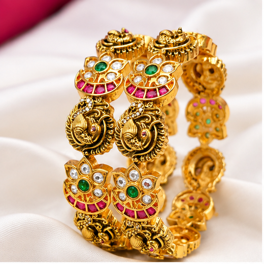 Matte Finishing Peacock And Floral Motifs Adorned With White,Green And Pink Stones