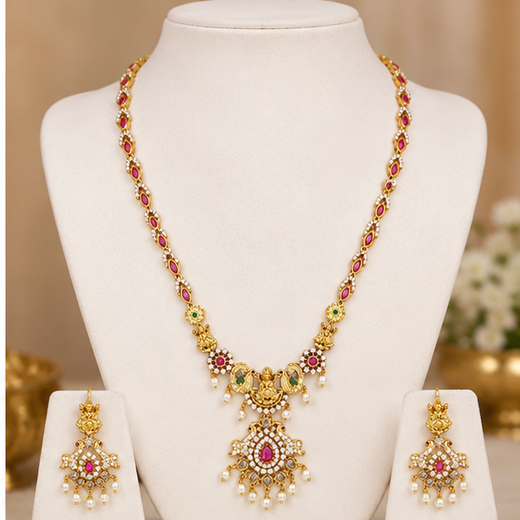 Matte finishing lord Lakshmi with pink stones and peacock finish Long haram